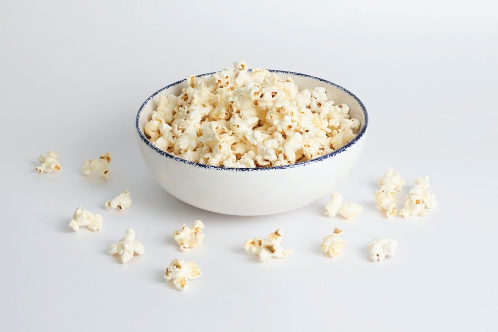 white popcorn in white ceramic bowl